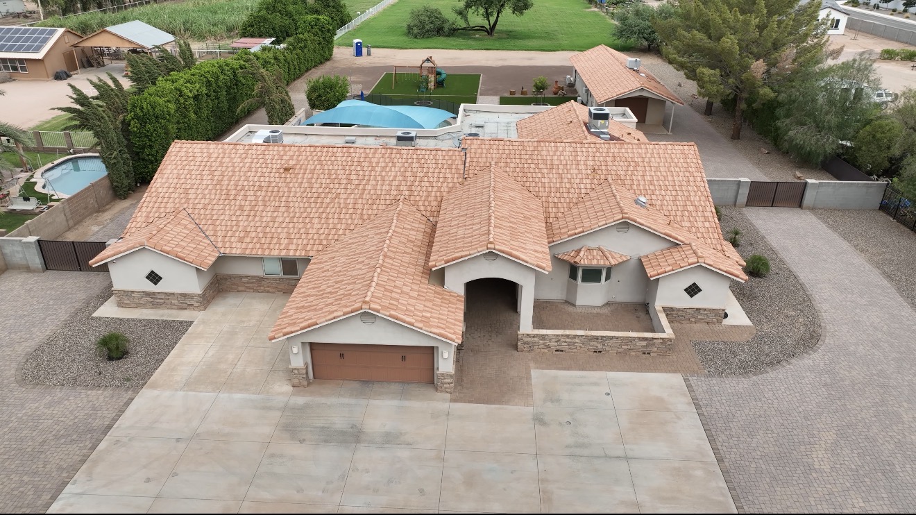 Completed concrete tile roof on a Chandler AZ 85249 county island home by Power Peak Roofing