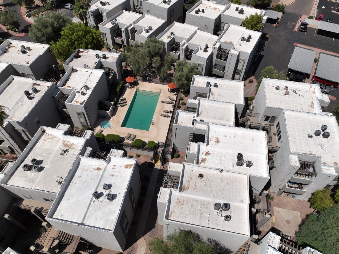 Aerial view of the La Casa de Fuente condominium community roofs in Scottsdale AZ before elastomeric recoating